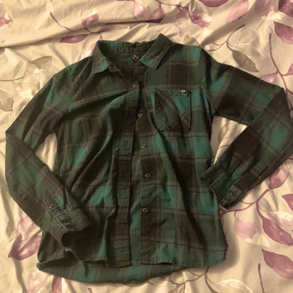 Green and black plaid flannel. Fox